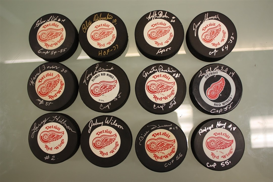 Detroit Red Wings 1955 Cup Lot of 12 Autographed Pucks (A)