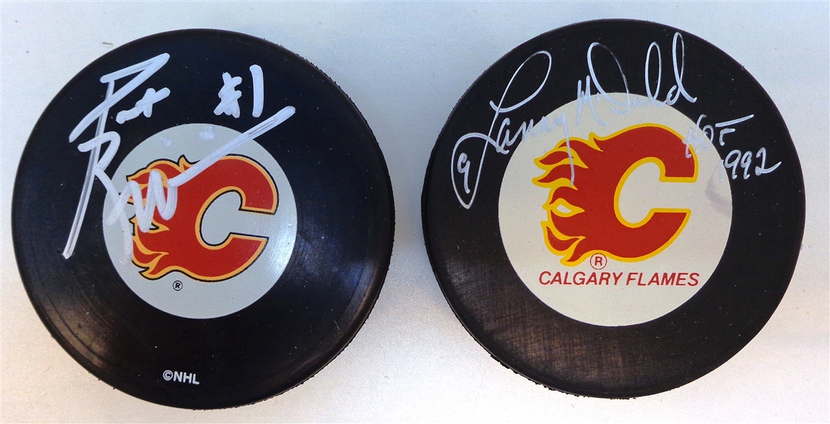 Calgary Flames Autographed Puck Lot