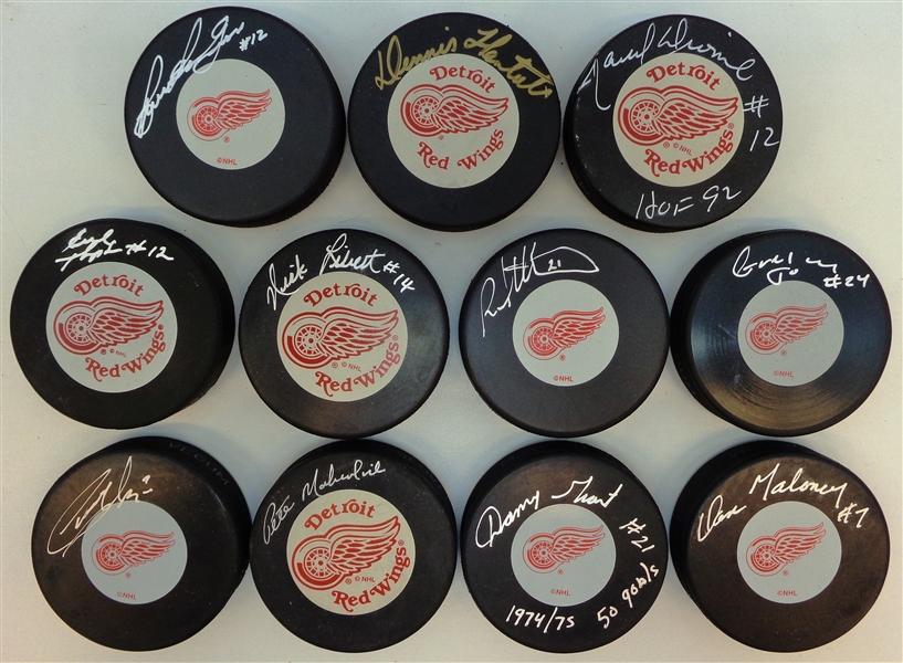 1970s Detroit Red Wings Autographed Puck Lot