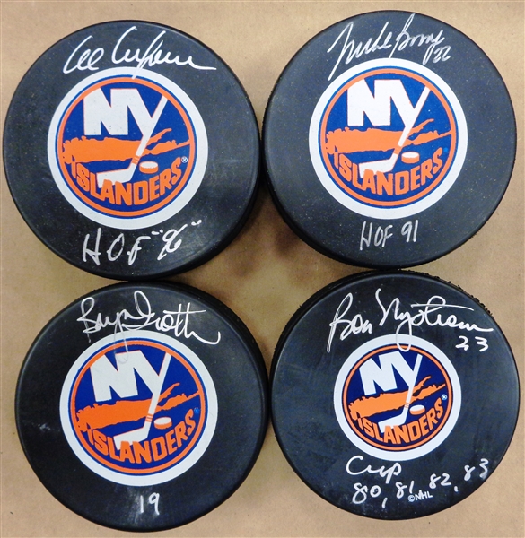 New York Islanders Autographed Puck Lot of 4