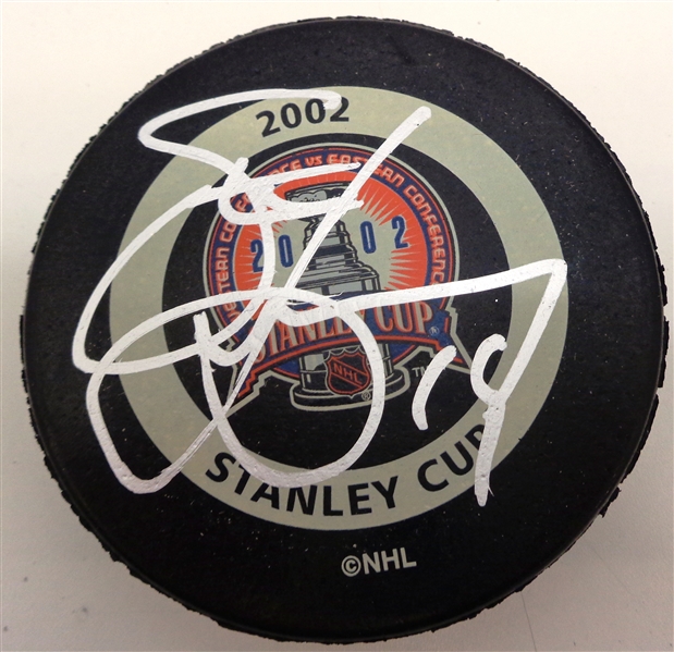 Steve Yzerman Autographed 2002 Stanley Cup Game Puck