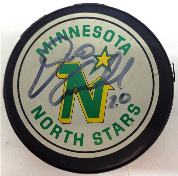 Dino Ciccarelli Autographed North Stars Puck