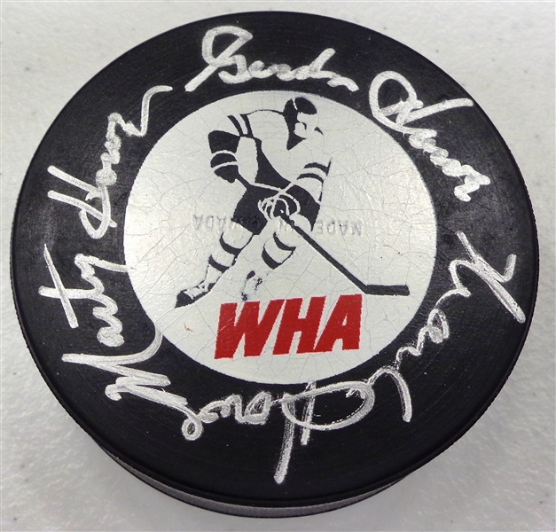 Gordie, Mark & Marty Howe Autographed WHA Puck