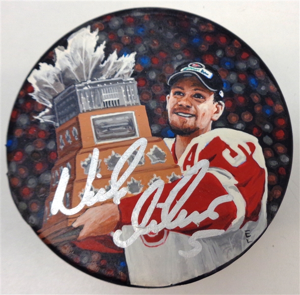 Nick Lidstrom Autographed Hand Painted Puck