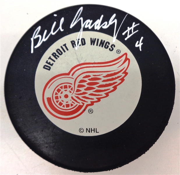Bill Gadsby Autographed Red Wings Puck