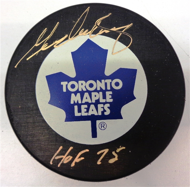 George Armstrong Autographed Leafs Puck w/ HOF 75