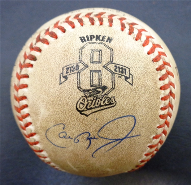 Cal Ripken, Jr. Game Used Ball from Game #2131 - Signed by Umpires, too!