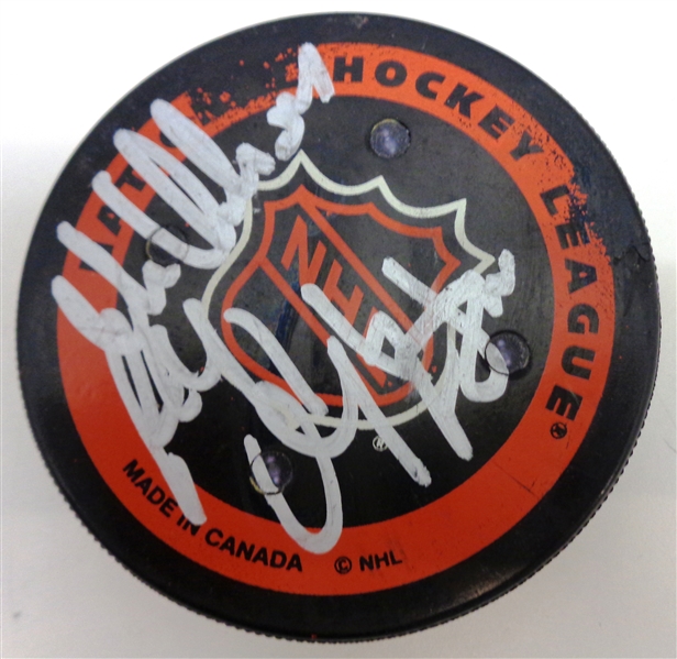 FoxTrax Puck Autographed by Chelios, Coffey and McCarty
