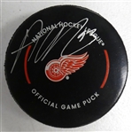 Alex DeBrincat Autographed Red Wings Puck