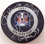Grind Line Autographed 1997 Stanley Cup Game Puck (Kocur/Maltby/Draper)