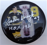 Johnny Bucyk Autographed Photo Puck w/ HOF 1981
