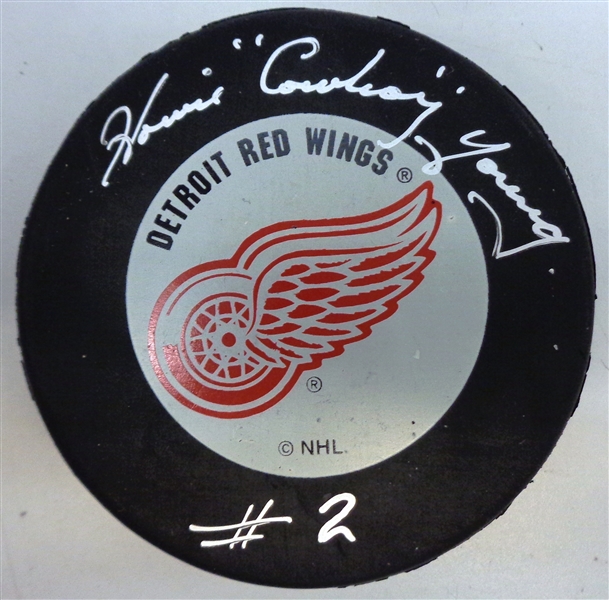 Howie "Cowboy" Young Autographed Red Wings Puck
