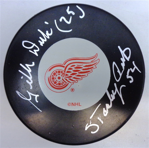 Gilles Dube Autographed Red Wings Puck