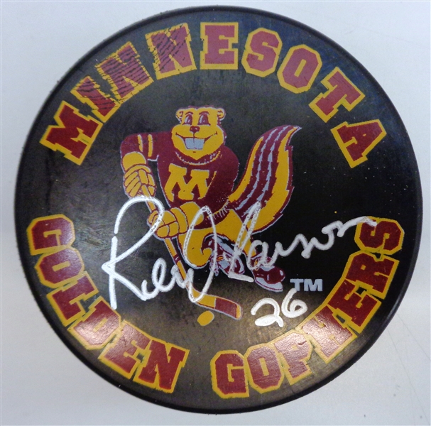 Reed Larson Autographed Minnesota Puck