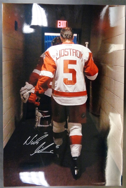 Nick Lidstrom Autographed 20x30 Walking Off Photo