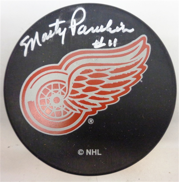 Marty Pavelich Autographed Red Wings Puck