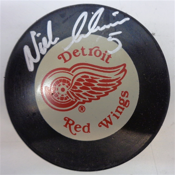 Nick Lidstrom Autographed Red Wings Puck
