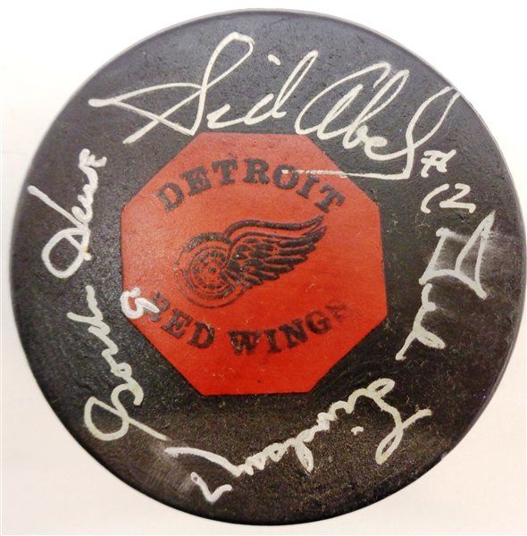 Production Line Autographed Vintage Red Wings Game Puck - Howe/Abel/Lindsay