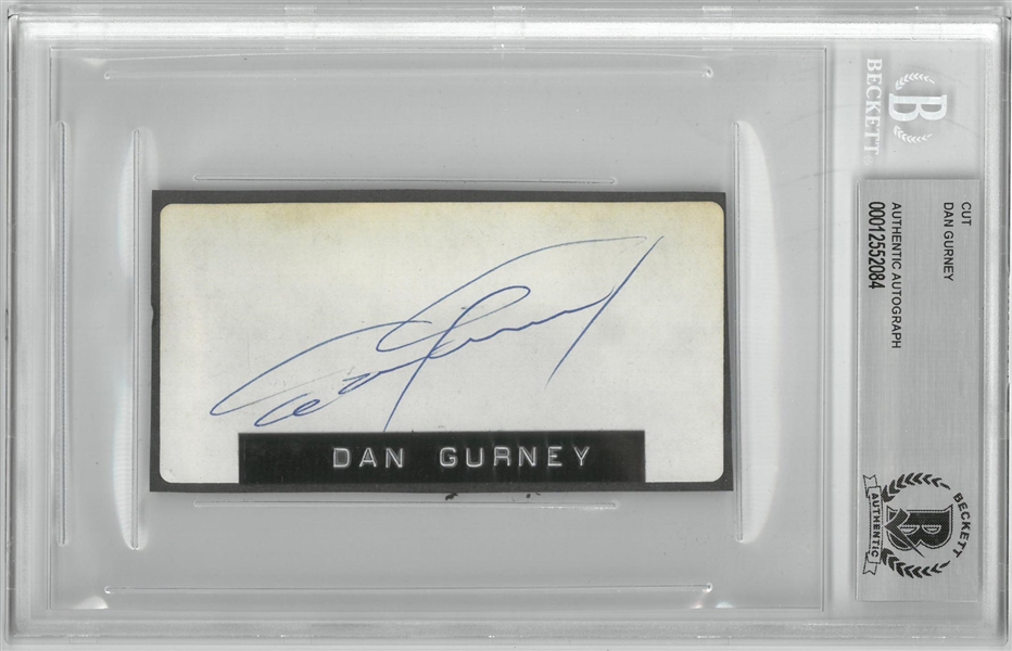 Dan Gurney Autographed 2x4 Cut