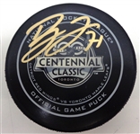 Dylan LArkin Autographed Centennial Classic Game Puck