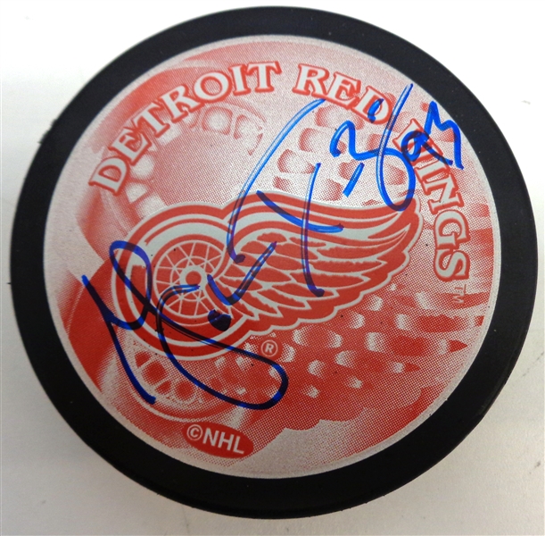 Johan Franzen Autographed Red Wings Puck