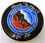 Howie Meeker Autographed Red Wings Puck