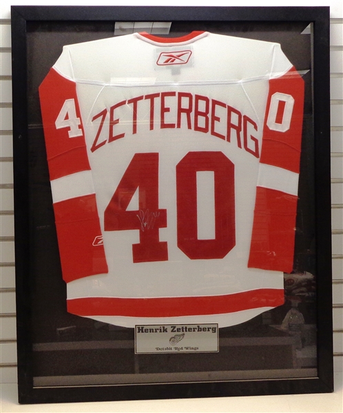 Henrik Zetterberg Autographed Framed Jersey (Pick up only)