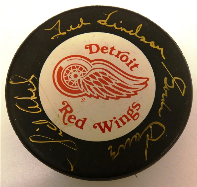 Production Line Autographed Red Wings Puck (Abel, Lindsay, Howe)