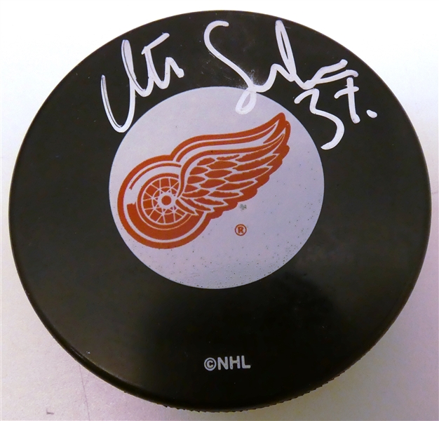 Mikael Samuelsson Autographed Red Wings Puck