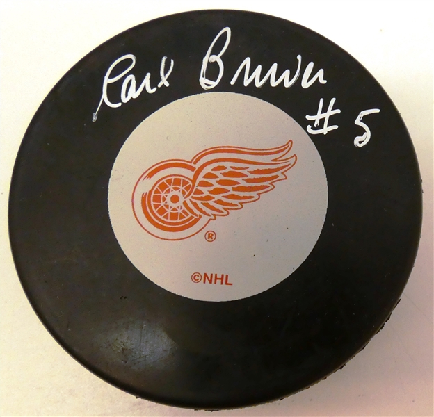 Carl Brewer Autographed Red Wings Puck