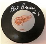 Carl Brewer Autographed Red Wings Puck