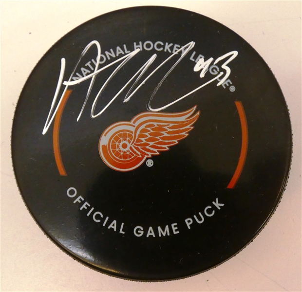 Alex DeBrincat Autographed Red Wings Puck