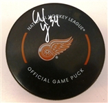 Alex Lyon Autographed Red Wings Puck