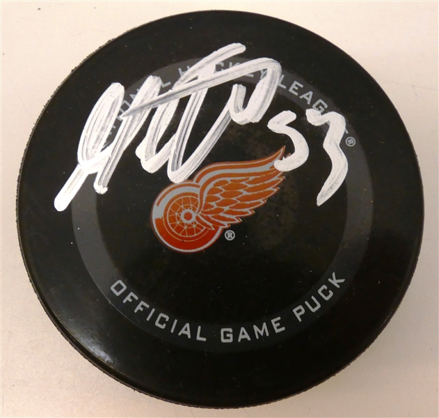 Moritz Seider Autographed Red Wings Puck