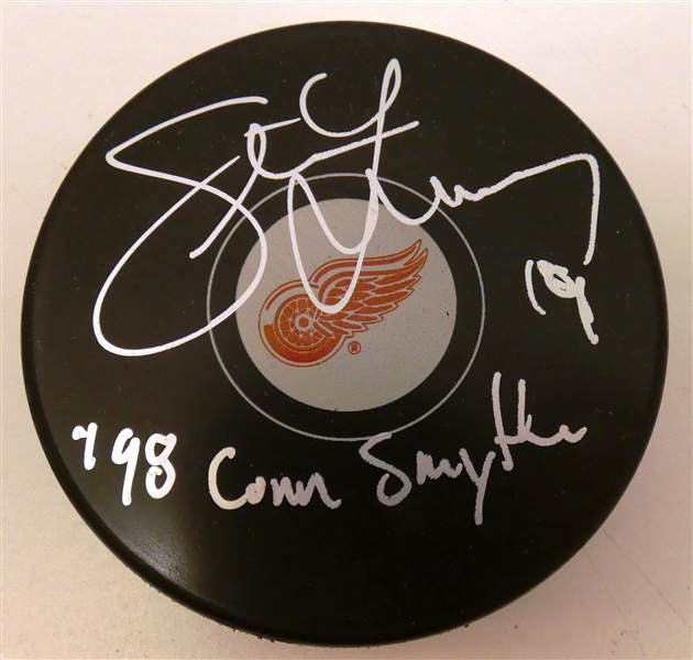 Steve Yzerman Autographed Red Wings Puck w/ Conn Smythe
