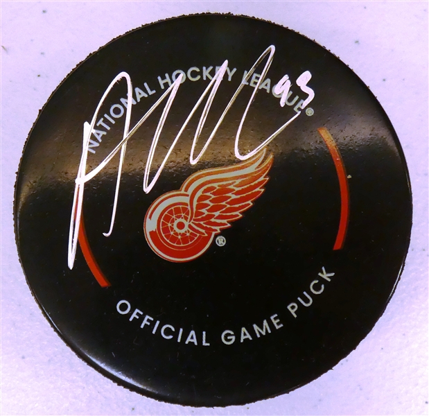 Alex DeBrincat Autographed Red Wings Puck