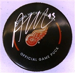 Alex DeBrincat Autographed Red Wings Puck