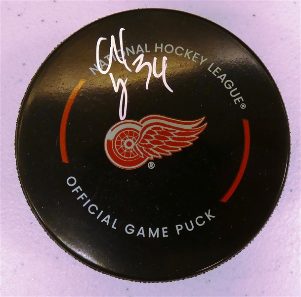 Alex Lyon Autographed Red Wings Puck