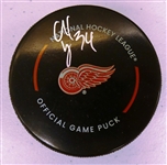 Alex Lyon Autographed Red Wings Puck