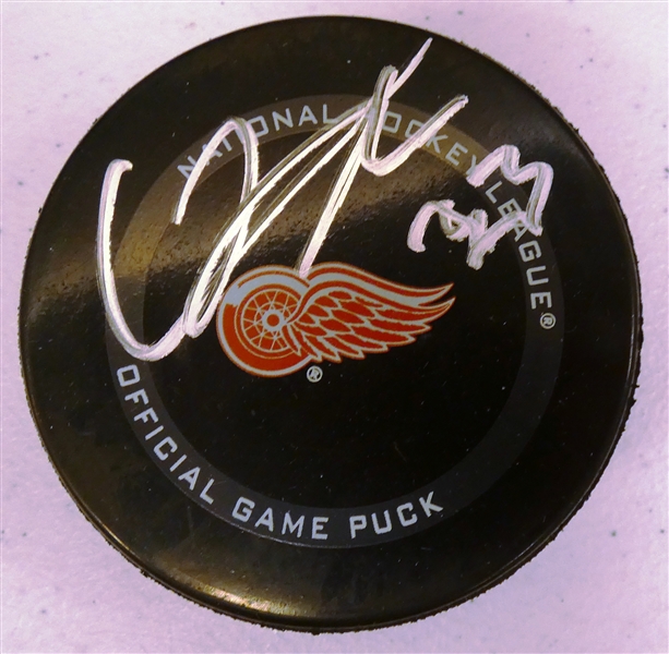 Lucas Raymond Autographed Red Wings Puck