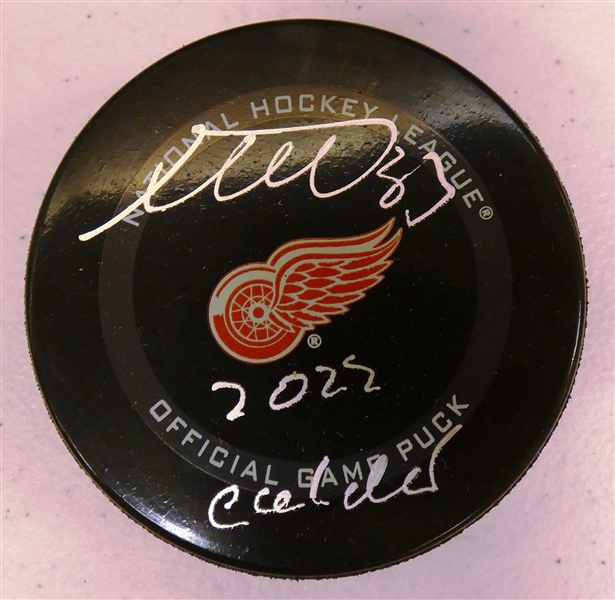 Moritz Seider Autographed Red Wings Puck