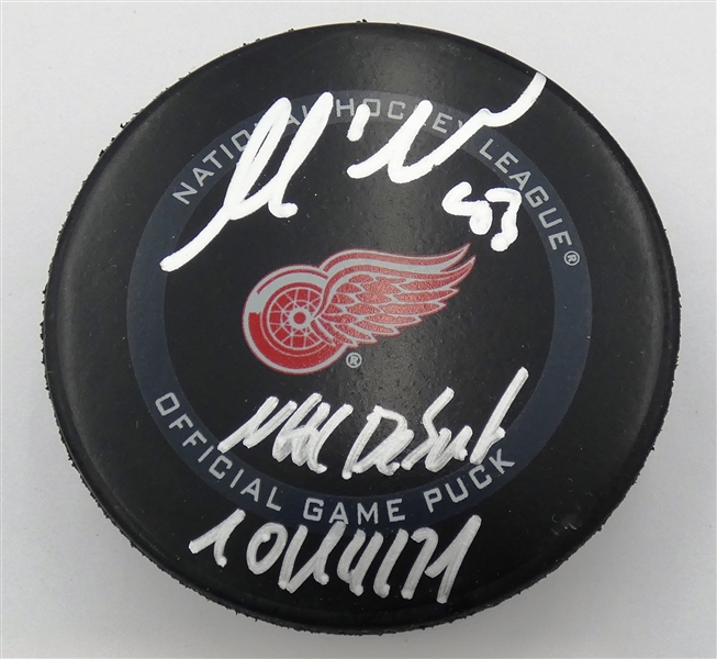 Moritz Seider Autographed Red Wings Puck