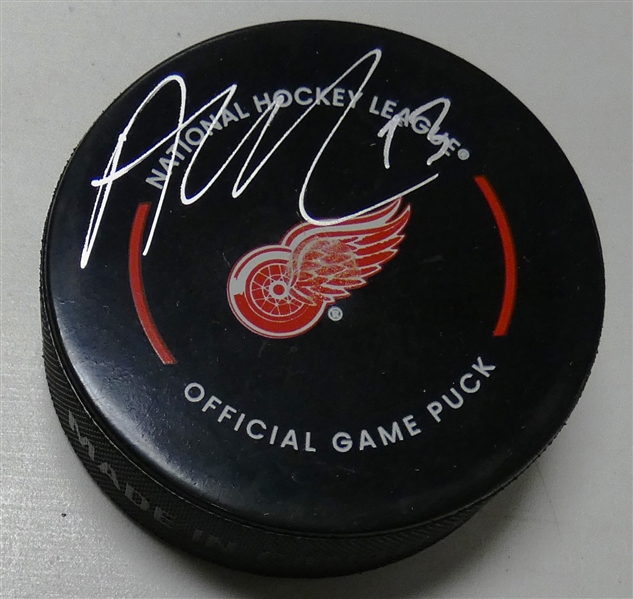 Alex DeBrincat Autographed Red Wings Puck