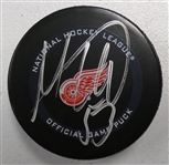Moritz Seider Autographed Red Wings Puck