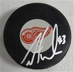 Darren Helm Autographed Red Wings Puck
