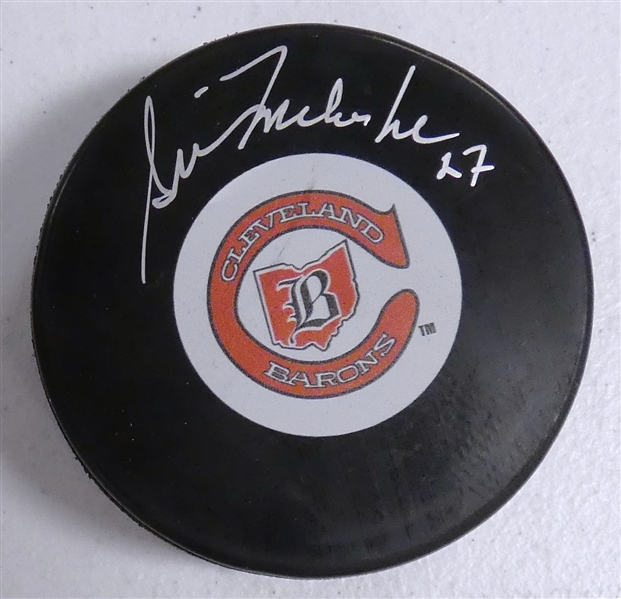 Gilles Meloche Autographed Barons Puck