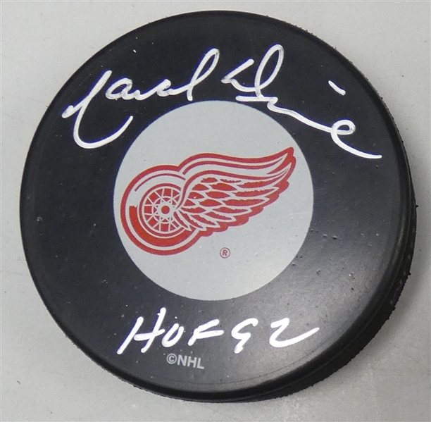 Marcel Dionne Autographed Red Wings Puck