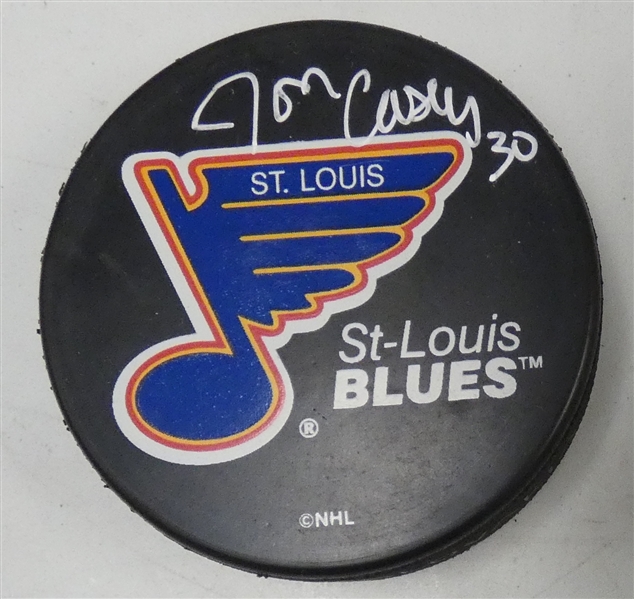 Jon Casey Autographed Blues Puck