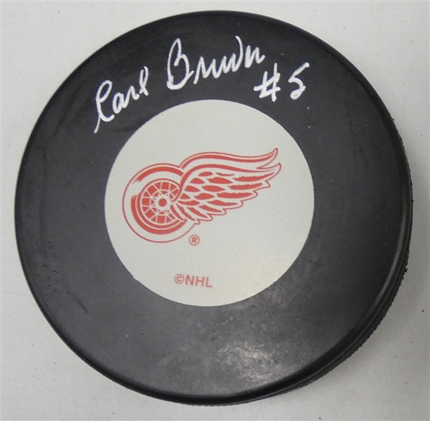 Carl Brewer Autographed Red Wings Puck