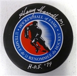 Harry Howell Autographed HOF Puck